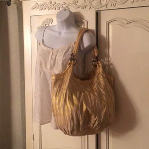 Straw & gold zebra patterned tote.